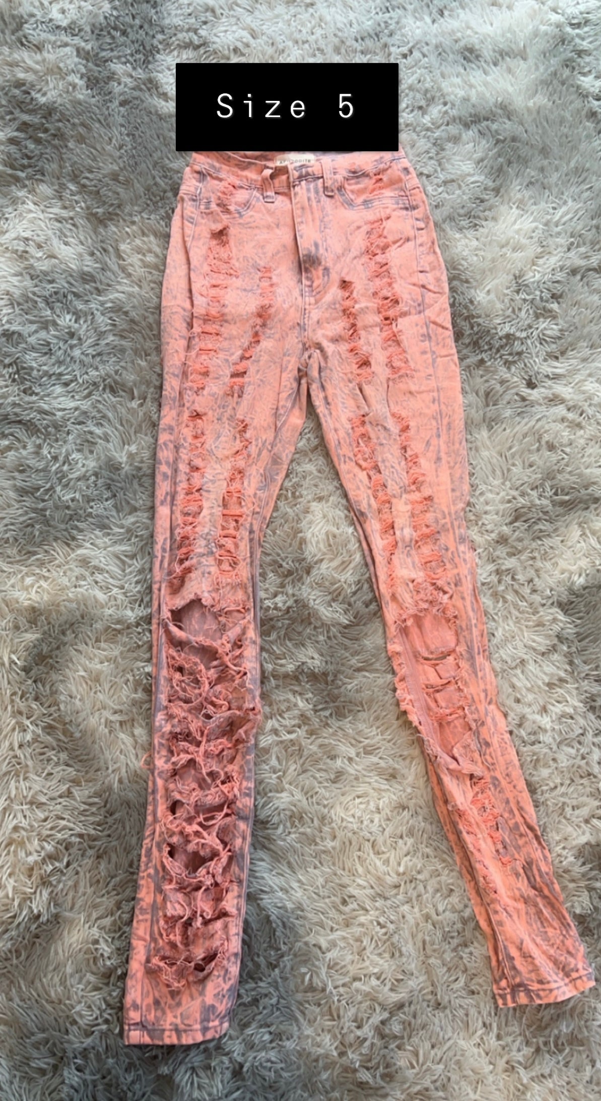 Pink distress jeans